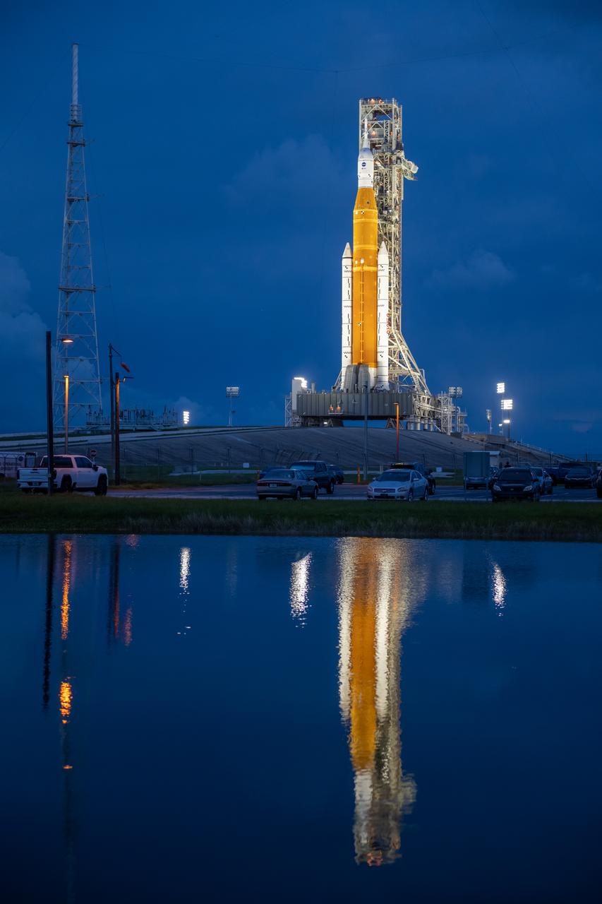 NASA’s Space Launch System (SLS) rocket with the Orion spacecraft aboard is seen atop the mobile launcher at Launch 39B at NASA’s Kennedy Space Center in Florida. Artemis I mission is the first integrated test of the agency’s deep space exploration systems: the Space Launch System rocket, Orion spacecraft, and supporting ground systems. The mission is the first in a series of increasingly complex missions to the Moon. Launch of the uncrewed flight test is targeted for no earlier than Sept. 3 at 2:17 p.m. ET. With Artemis missions, NASA will land the first woman and first person of color on the Moon, using innovative technologies to explore more of the lunar surface than ever before.